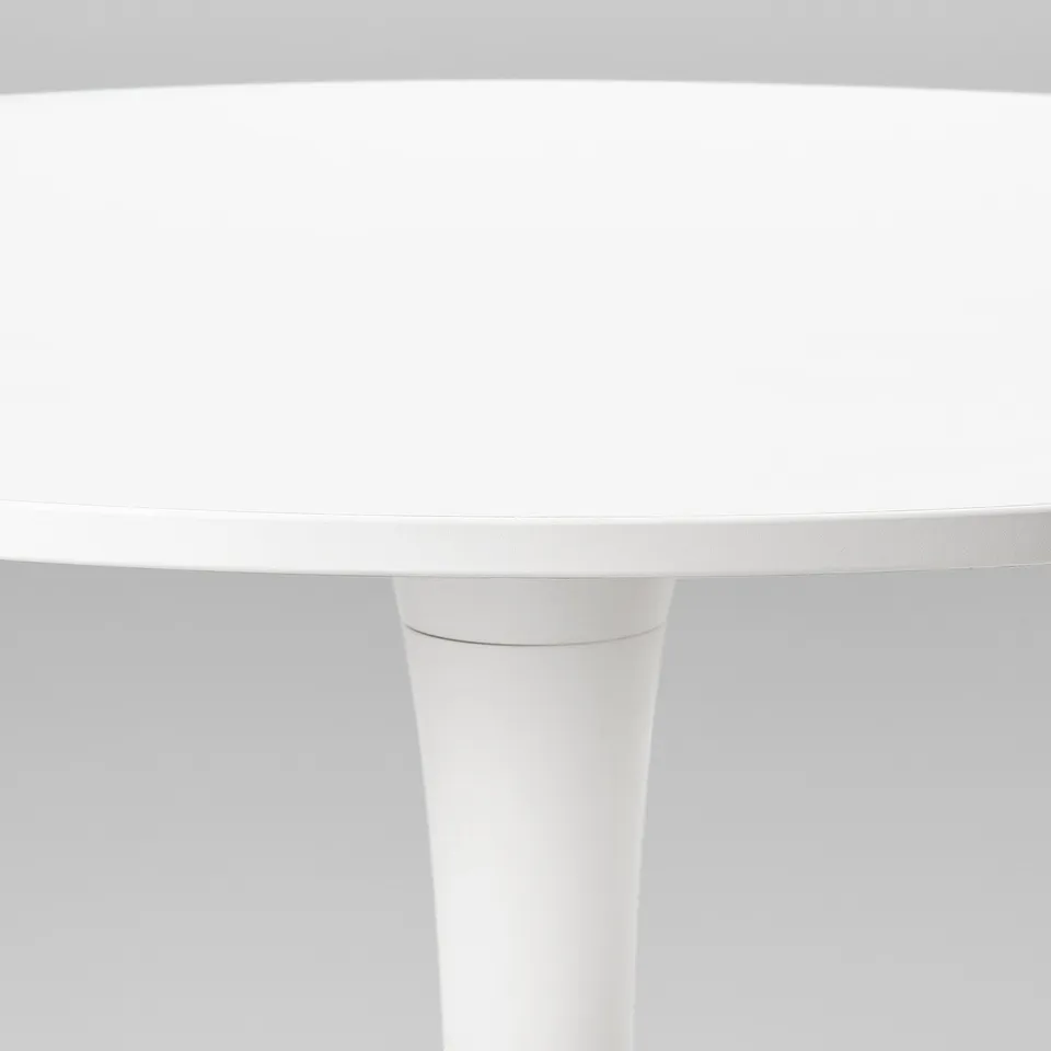 Modern white round dining table with smooth edges and sturdy base.