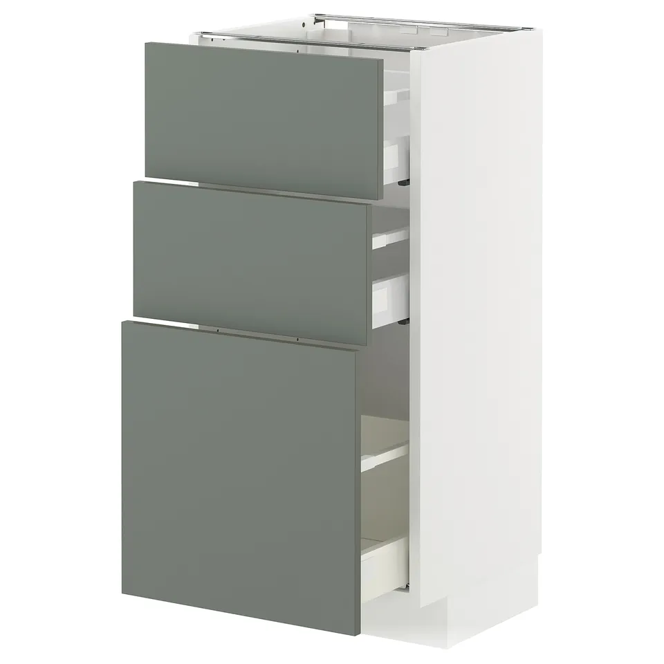 Modular kitchen cabinet with 3 grey-green drawers, white frame.