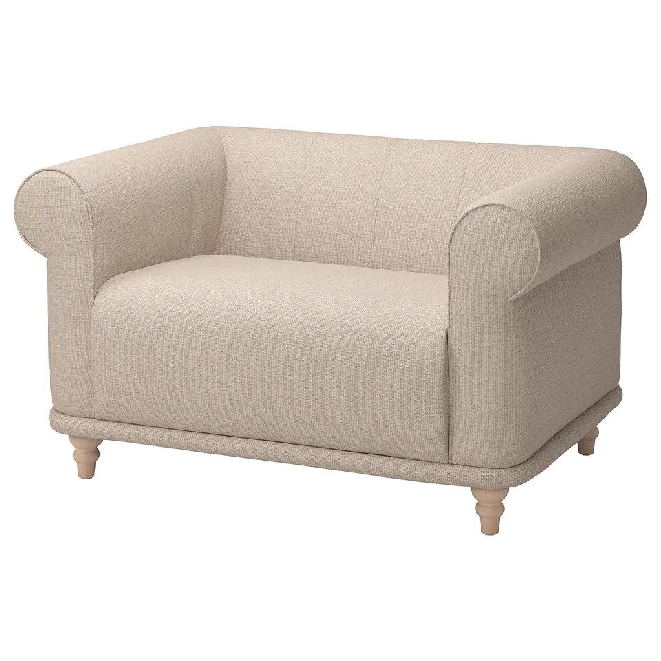 VISKAFORS, a beige, fabric-covered armchair with rolled arms, wooden legs, and a soft, inviting design.