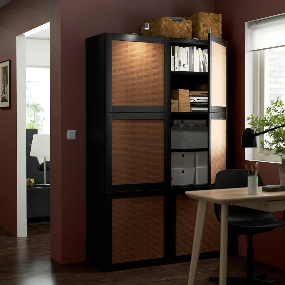 Modern office storage cabinet with adjustable shelves and integrated lighting.