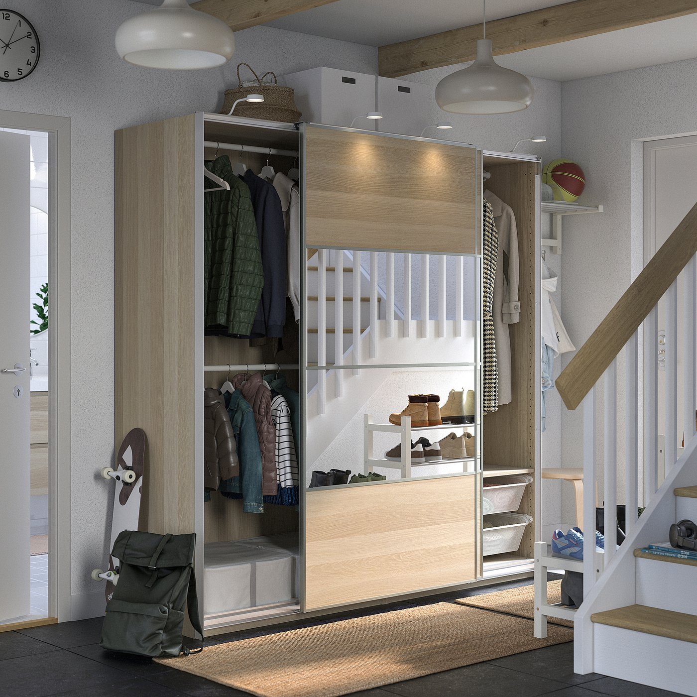 Organised closet with sliding doors, winding staircase, backpack, jackets, hats.