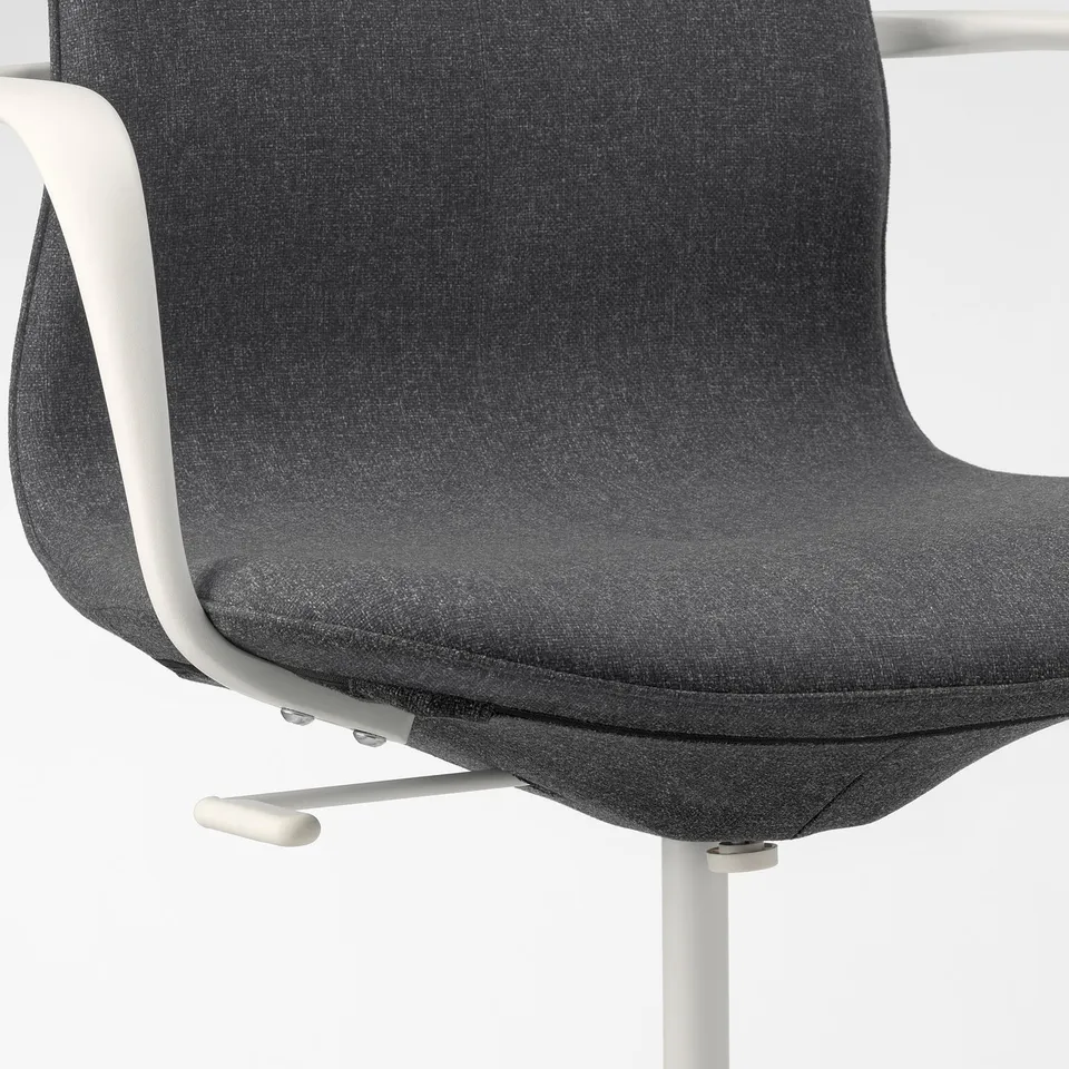 An office chairs lumbar support and tilt mechanism, designed for comfort and adjustability.