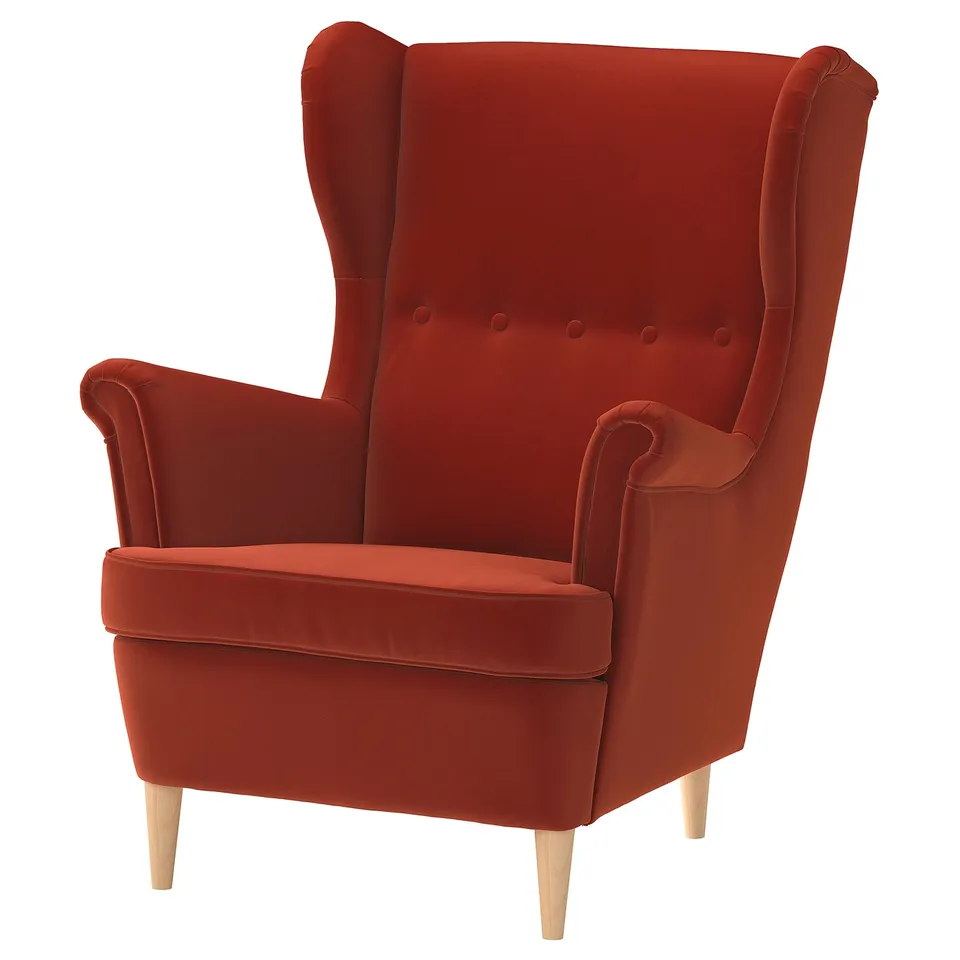 Red velvet wingback chair with wooden legs, high back, and rolled arms.