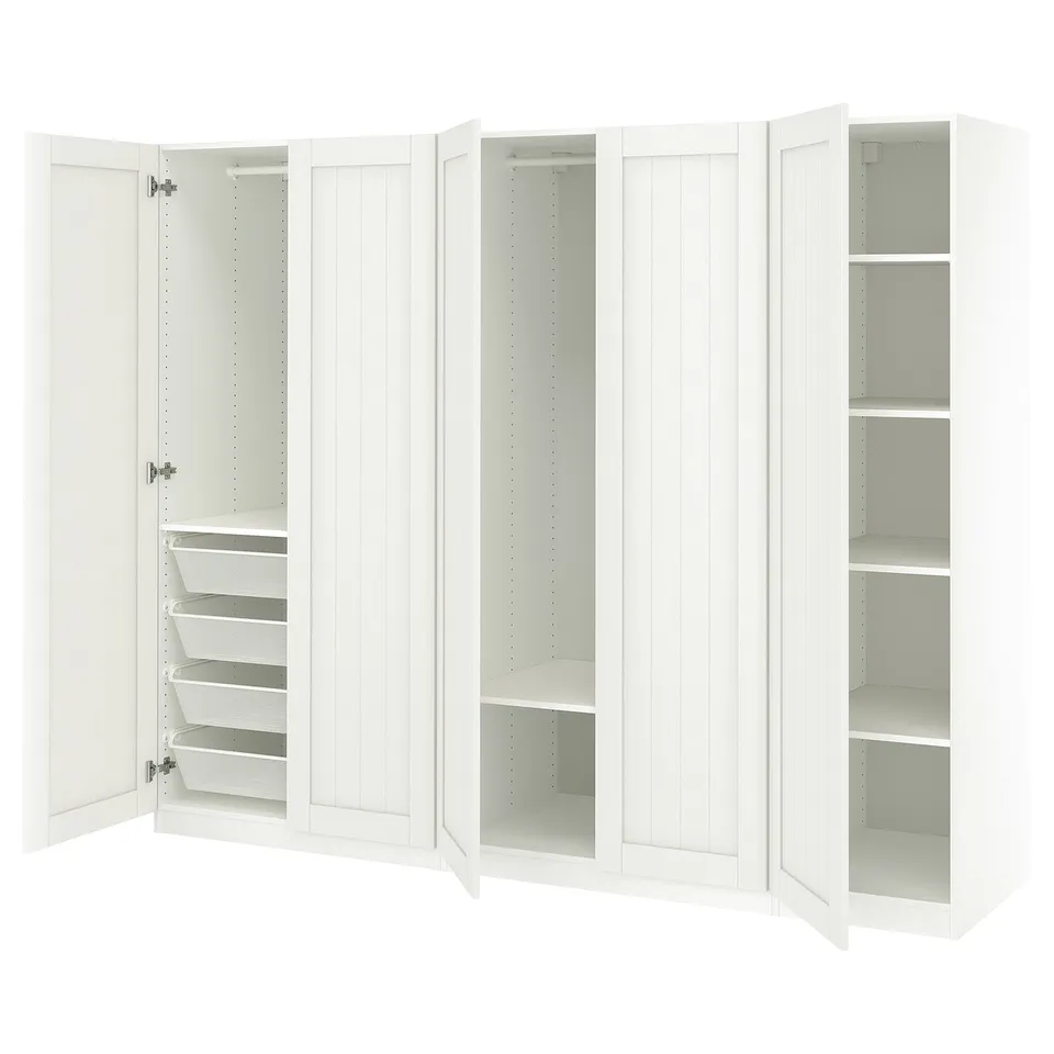 White PAX wardrobe with mesh baskets, adjustable shelves, and soft-closing doors.