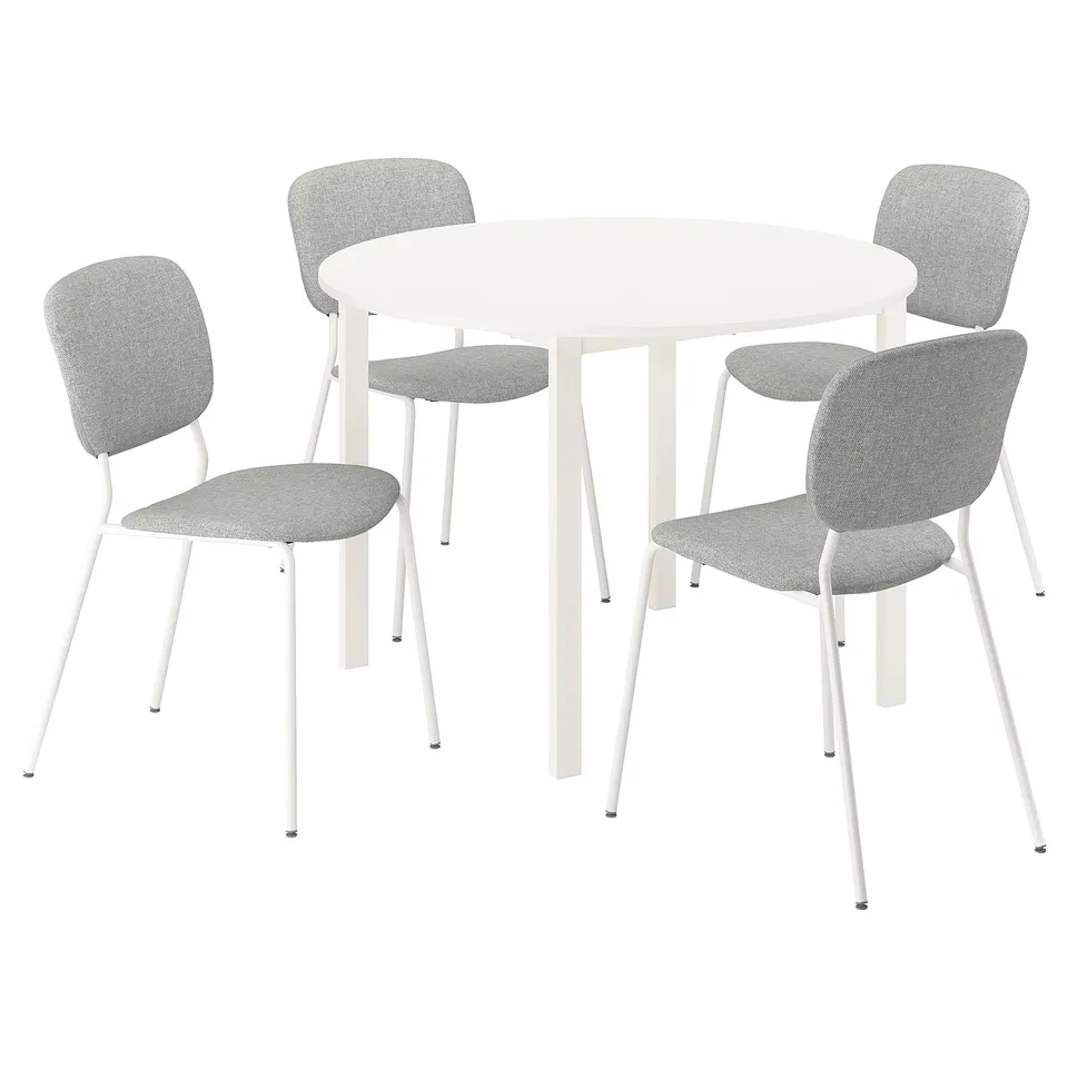 A VIHALS white round dining table and four grey chairs with modern minimalist design, made of steel and recycled materials.