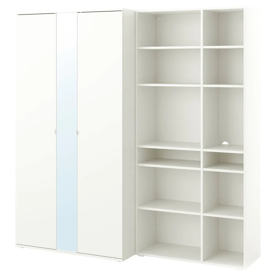 A white VIHALS furniture set with a wardrobe and shelving unit. The wardrobe has mirrored doors and the shelf unit has multiple empty shelves.