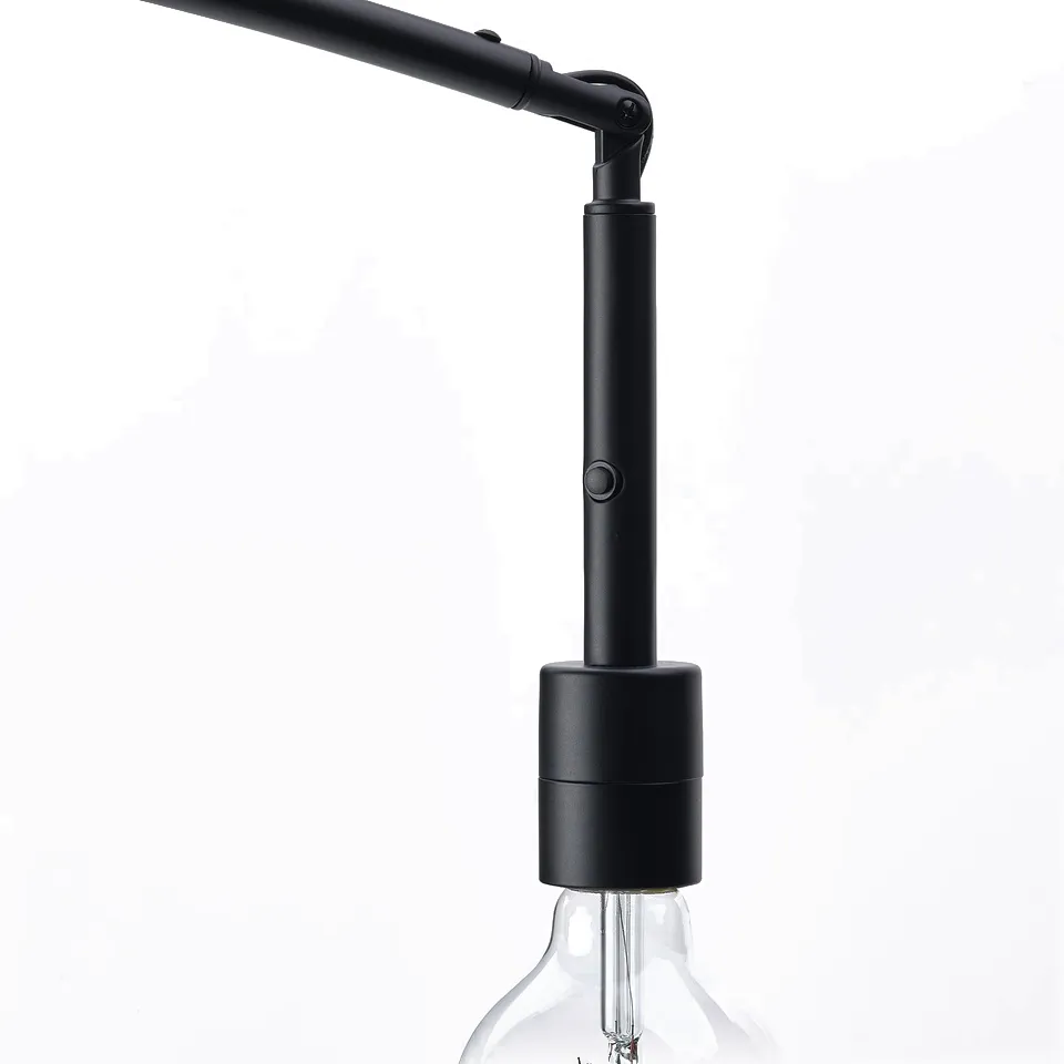 Black floor lamp with adjustable neck, power button, and large light bulb socket, on white background.