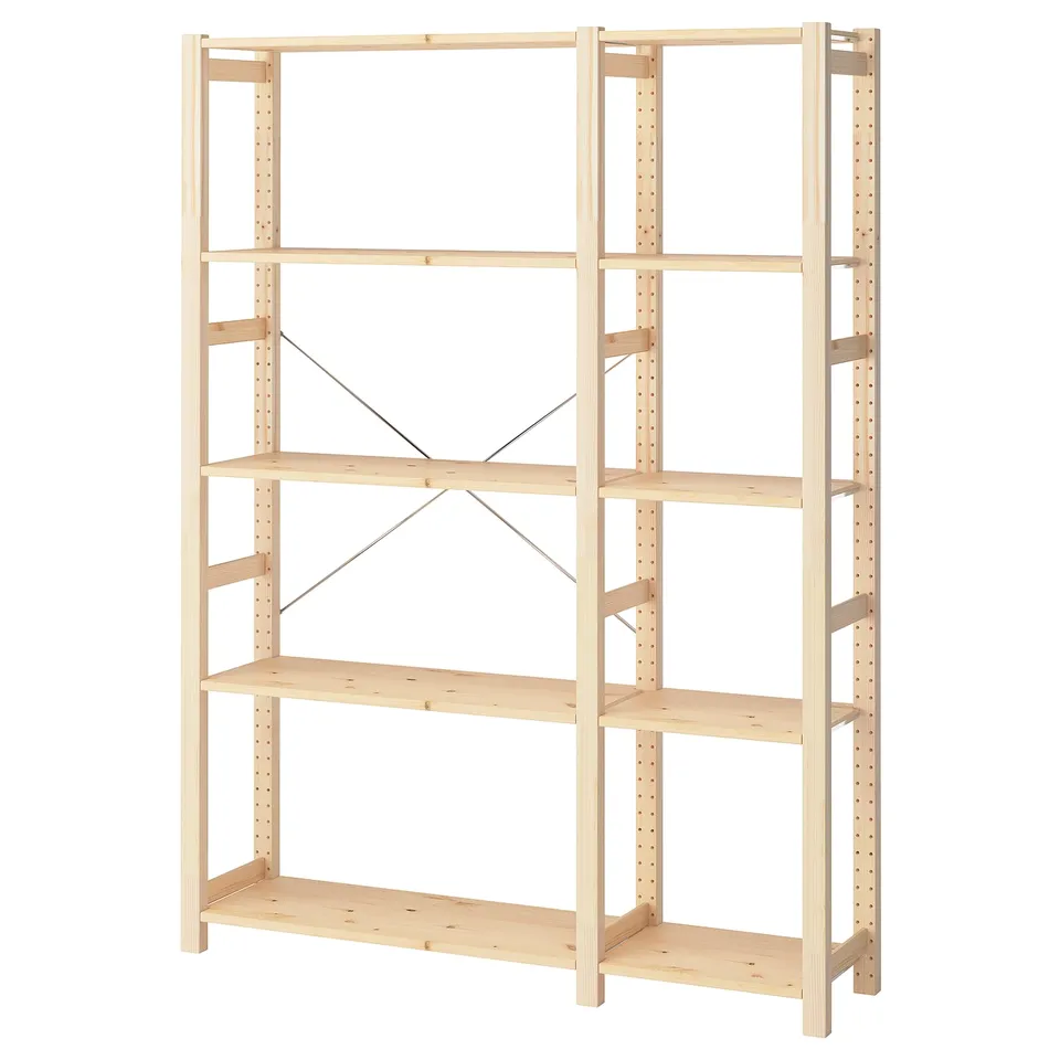The IVAR wooden shelf unit in natural finish, made of solid pine, with adjustable shelves and steel braces.