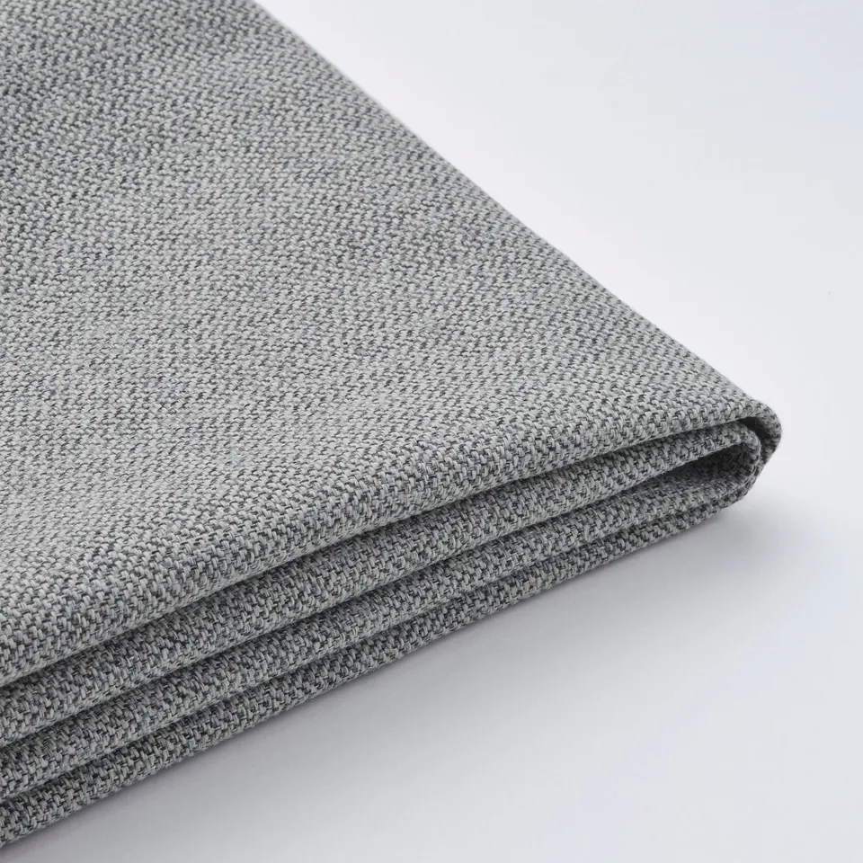 Folded grey fabric, smooth texture, neatly stitched edges.