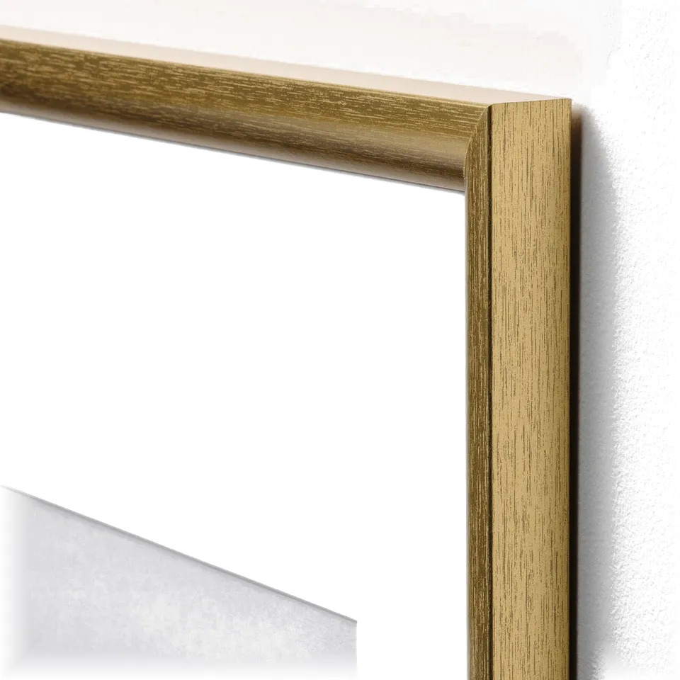 Gold picture frame corner with sleek finish and clean edges.