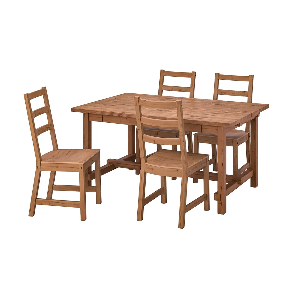 Rustic wooden dining set with rectangular table and ladderback chairs.