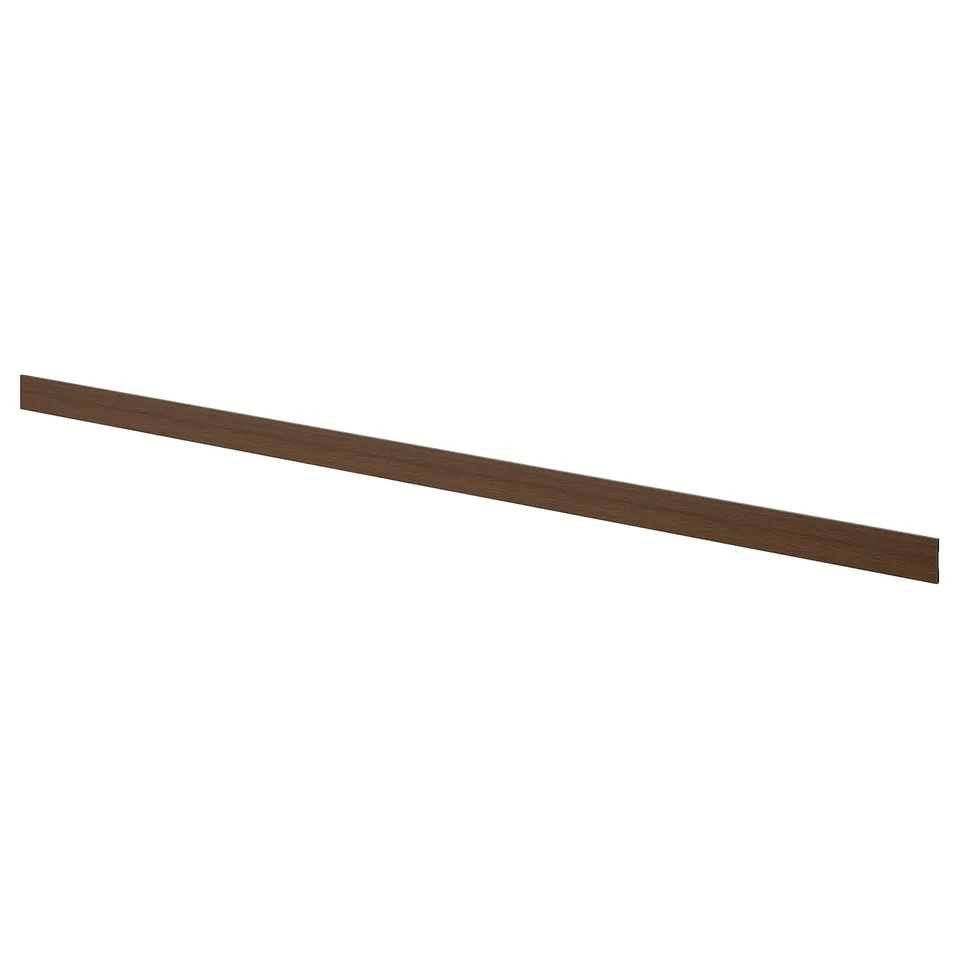 Dark brown ash veneer kitchen cabinet plinth.