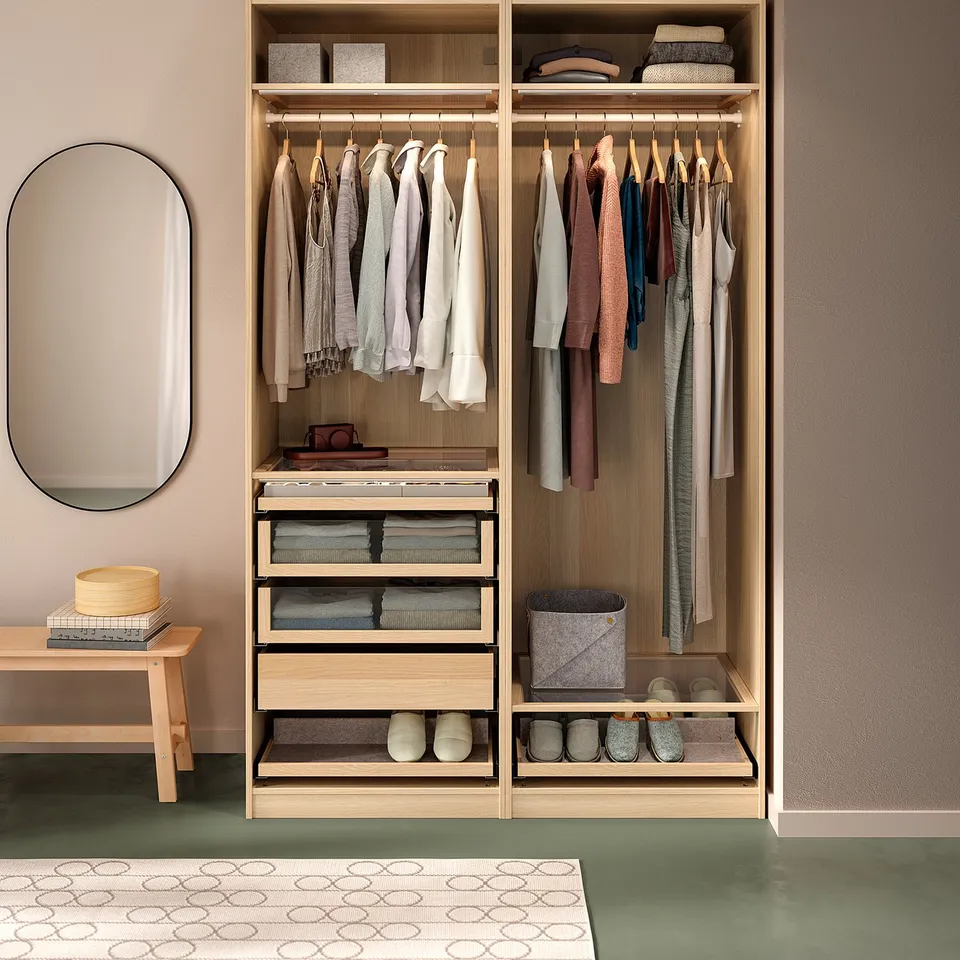 PAX wardrobe: wooden, light-colored, organised with clothes hangers, floating shelves, and shoe storage.