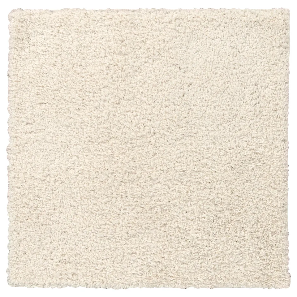 A square, ivory-colored, shaggy arende area rug with soft texture.