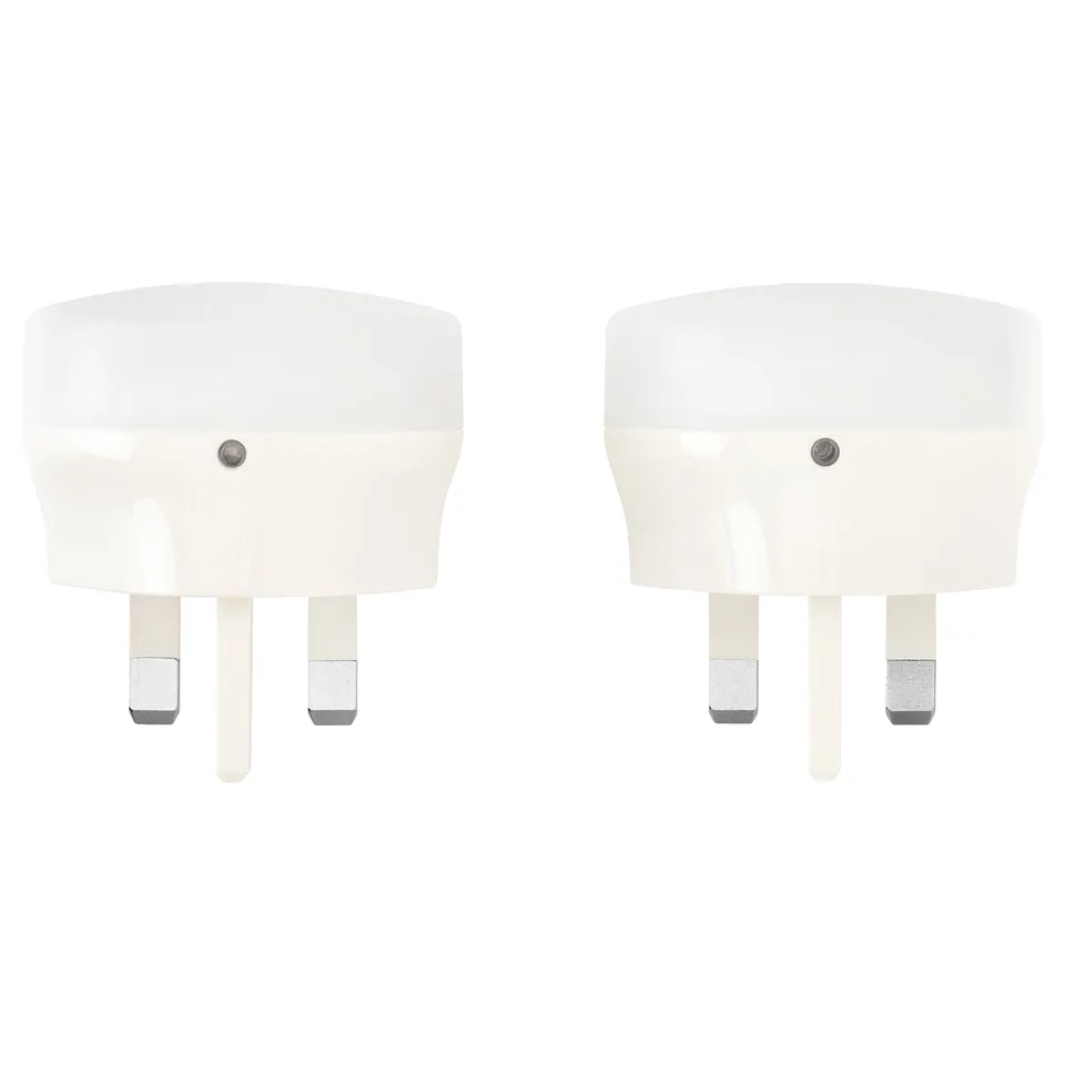 Shows two white MÖRKRÄDD night lights side by side for home use.