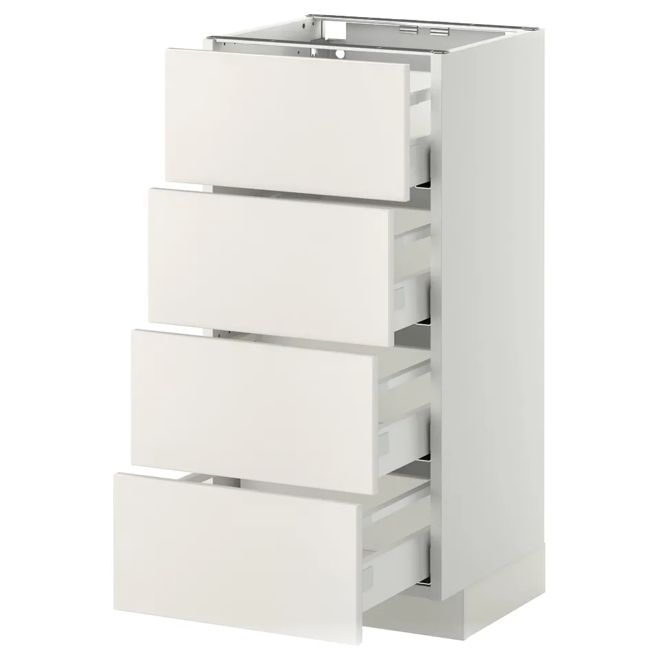 A white METOD kitchen unit with four full-extension drawers. It has a clean, modern design with smooth lines and a sturdy construction.