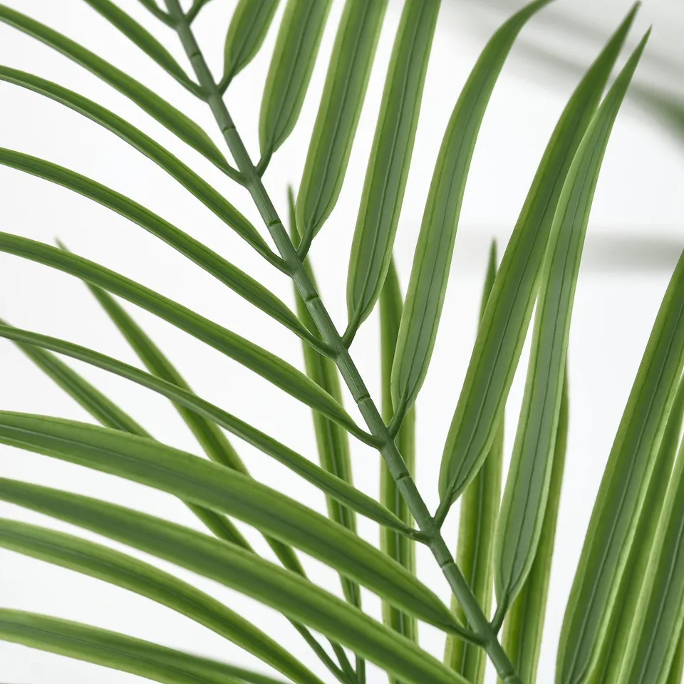 Close-up of vibrant, detailed artificial leaves, showcasing lifelike texture and quality.