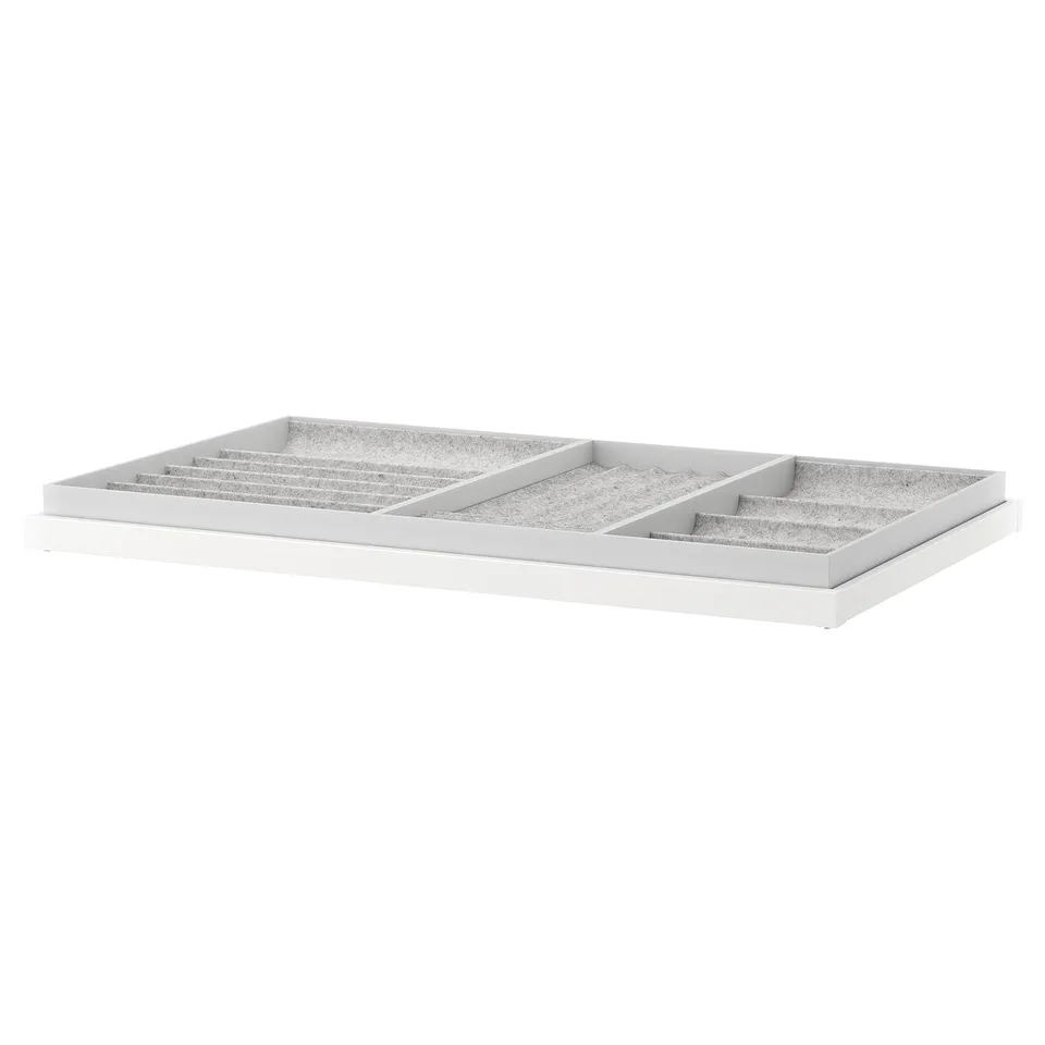 A white KOMPLEMENT organiser tray with felt lining for storing accessories.
