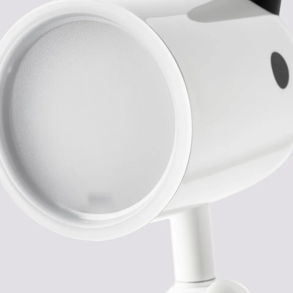 A white adjustable lamp with rotating arm and shade, ideal for focused lighting tasks.