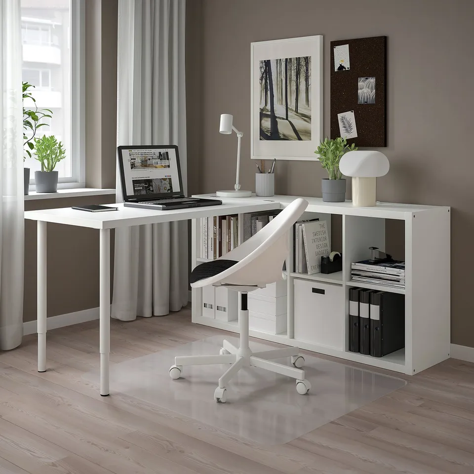 Modern workspace with INLÄGG table, kallax shelves, chair, lamp, plant, curtains, and window