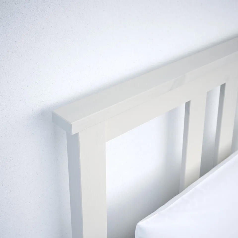 Crisp white bed frame, clean lines, sturdy pine craftsmanship.