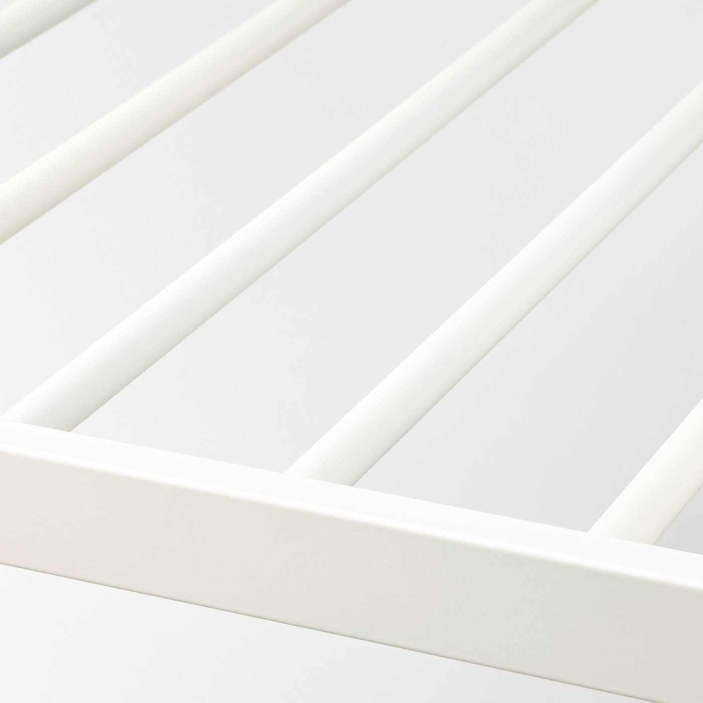 White trouser hanger with smooth, sliding drawers, sturdy modern design.