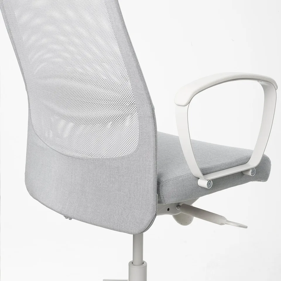 Ergonomic office chair with mesh back, armrests, adjustable tilt tension; ideal for comfortable, long-term seating.