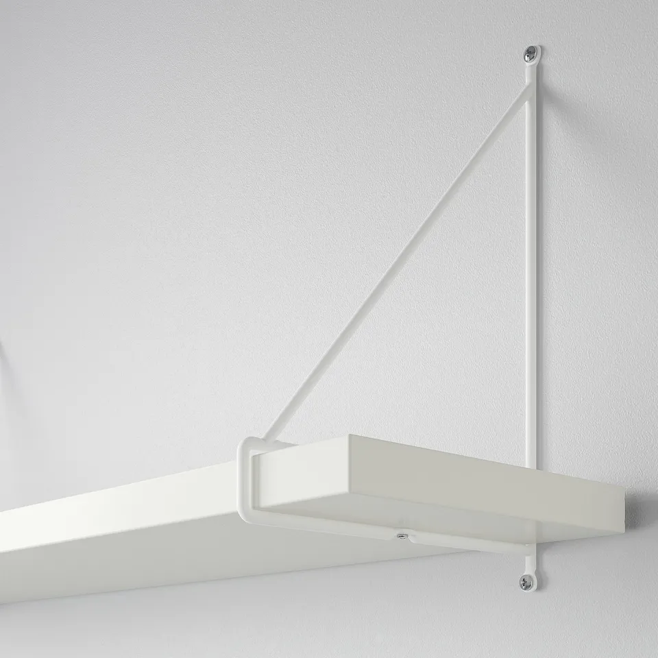 White wall-mounted shelf with metal brackets, securely fastened to wall, minimalist design.