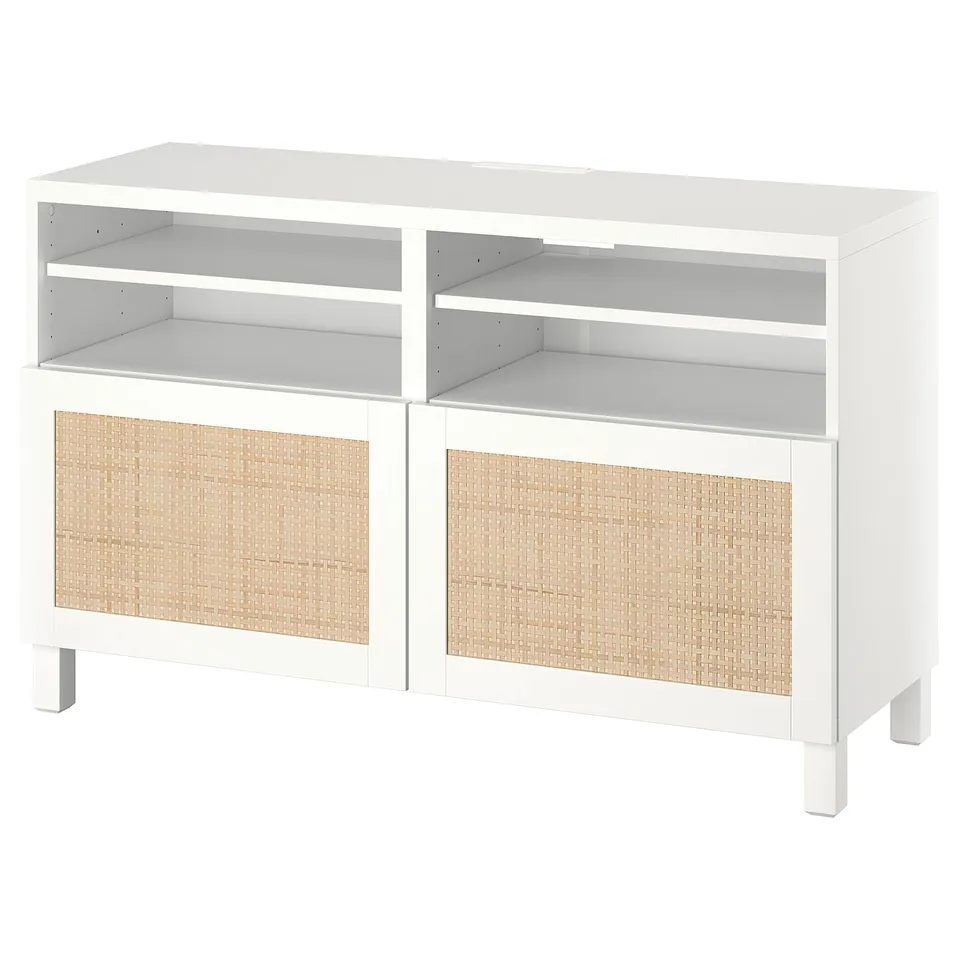 A white BESTÅ tv bench with woven panel doors, rectangular shelves, and square legs.
