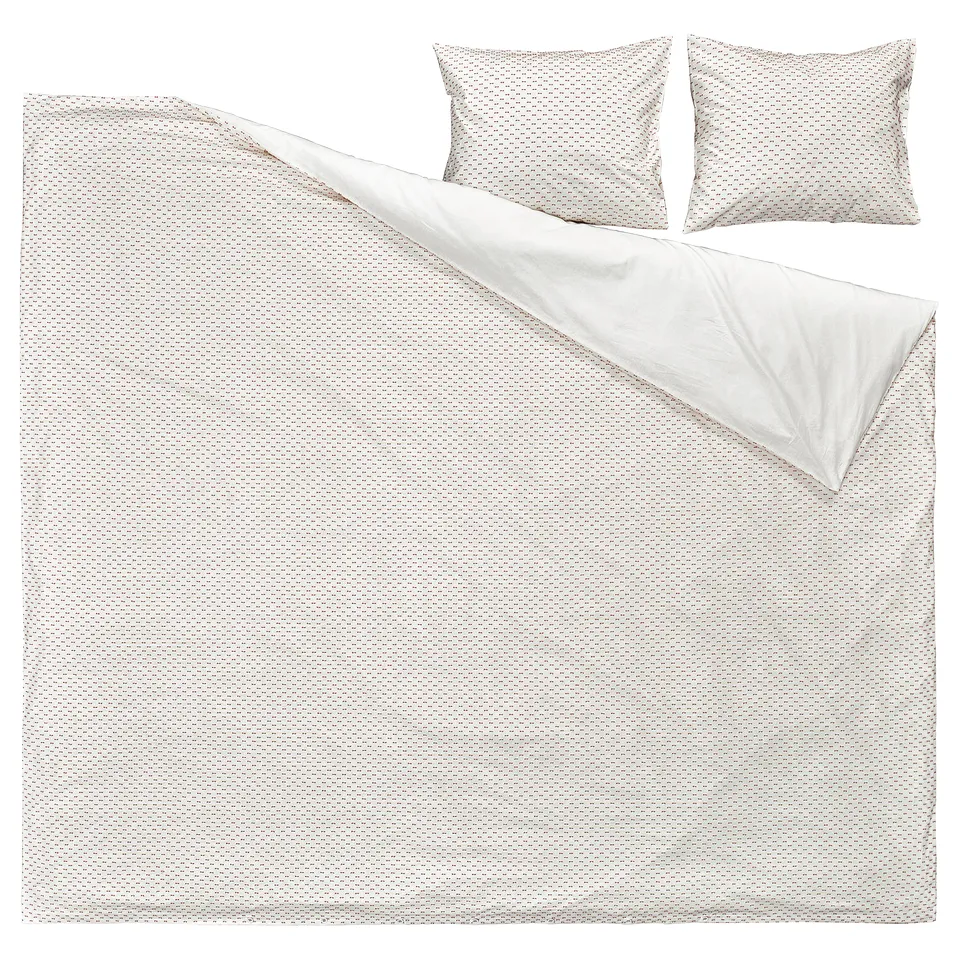BANDKNIPPE bedding: white duvet, beige pillows, 100% cotton.