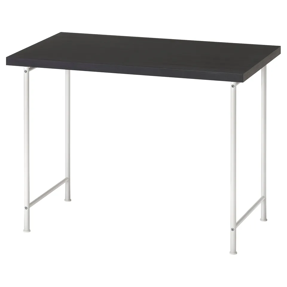 A LINNMON desk with a black top and white metal legs. It is modern, rectangular, and eco-friendly.