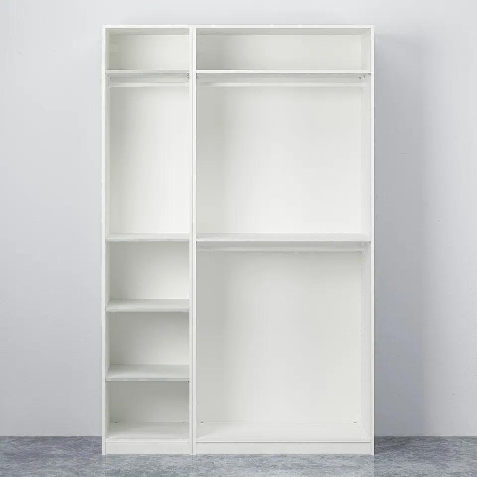 Empty, white, freestanding PAX wardrobe with multiple shelves, adjustable feet, and no doors.