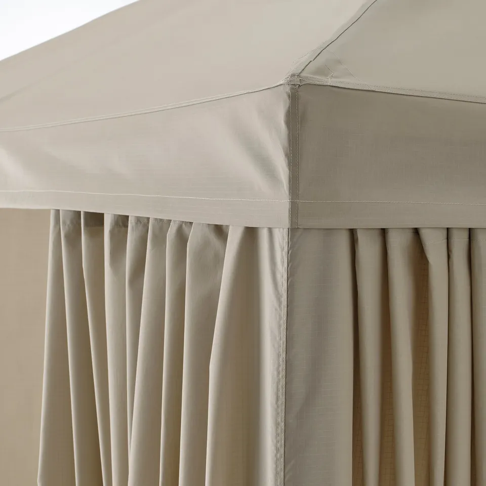 Gazebo with vented canopy, sturdy frame, uv protective fabric.