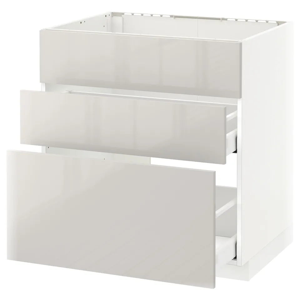 White METOD kitchen unit, glossy finish, rectangular shape with two open drawers.