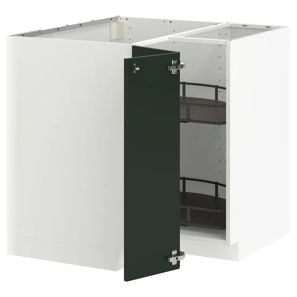 A white METOD kitchen cabinet with a green door and adjustable shelves.