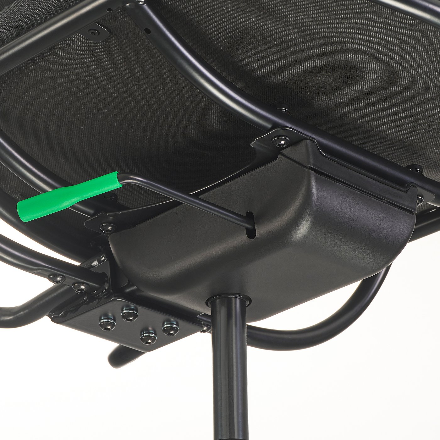 Black gaming chairs underside with adjustable tilt mechanism and green handle.