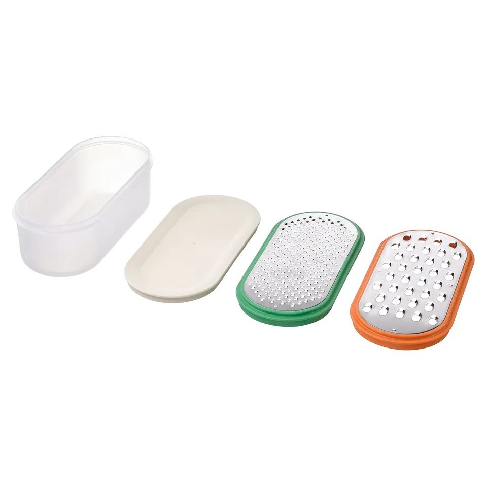 UPPFYLLD graters: white, green, orange. Plastic, stainless steel, direct storage.