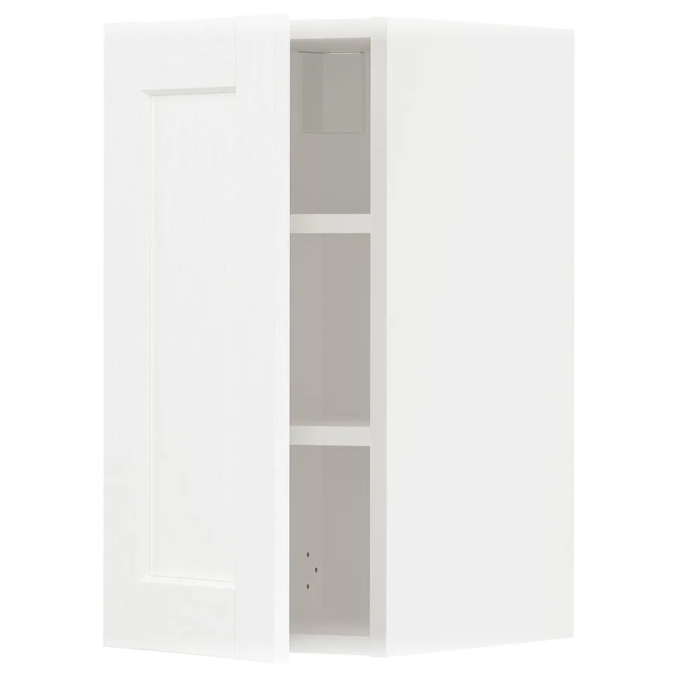 White wall cabinet for kitchen, part of the METOD system, featuring adjustable shelves with a classic wood grain design, mounted on minimalist hinges.