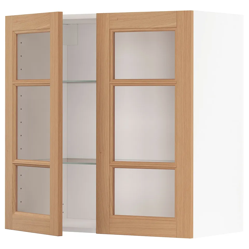 Light wooden-framed kitchen cabinet with frosted glass doors.