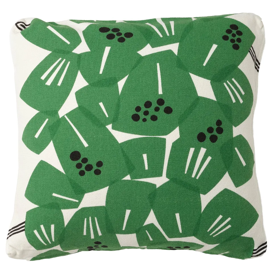 Green leaf-patterned UNDERBLOMMA pillow, white background, durable cotton/jute, zip for washing.