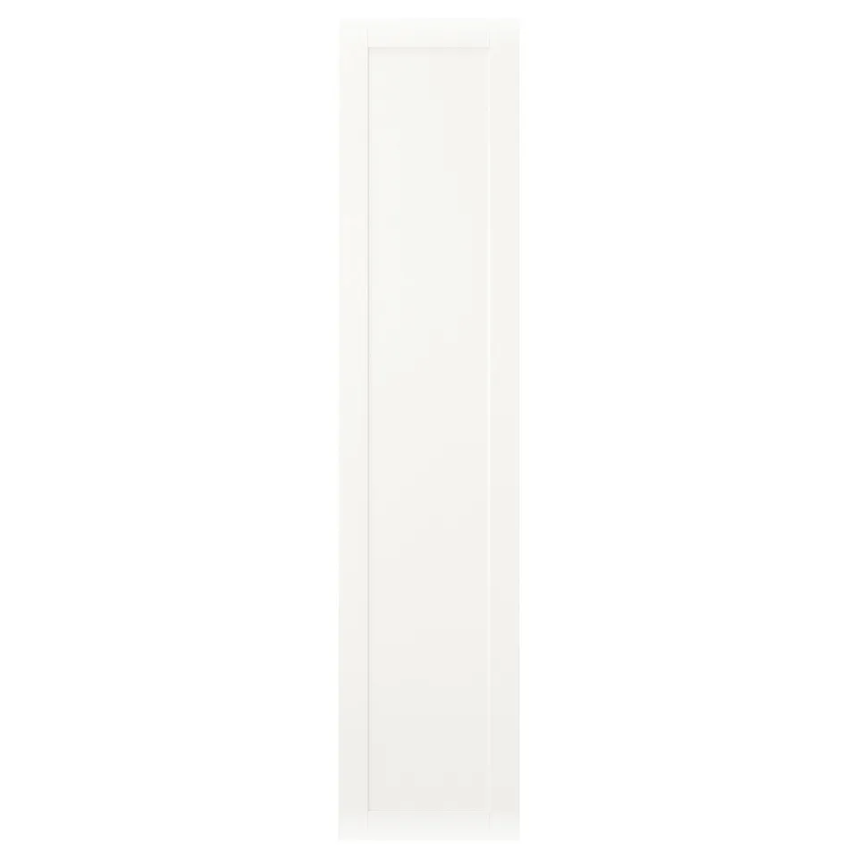 A SANNIDAL white door for platsa storage. Simple design, rectangular shape. Made from fibreboard and steel hinges.