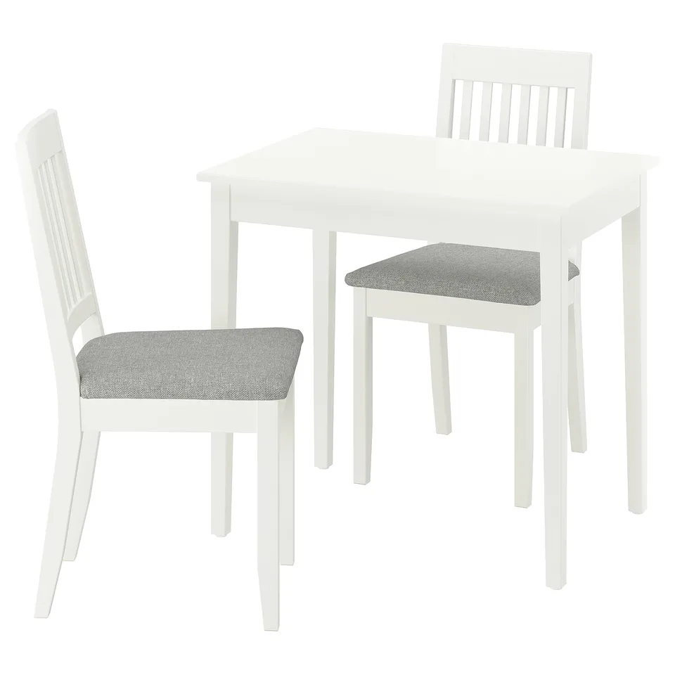Minimalist white dining set with grey cushioned chairs.