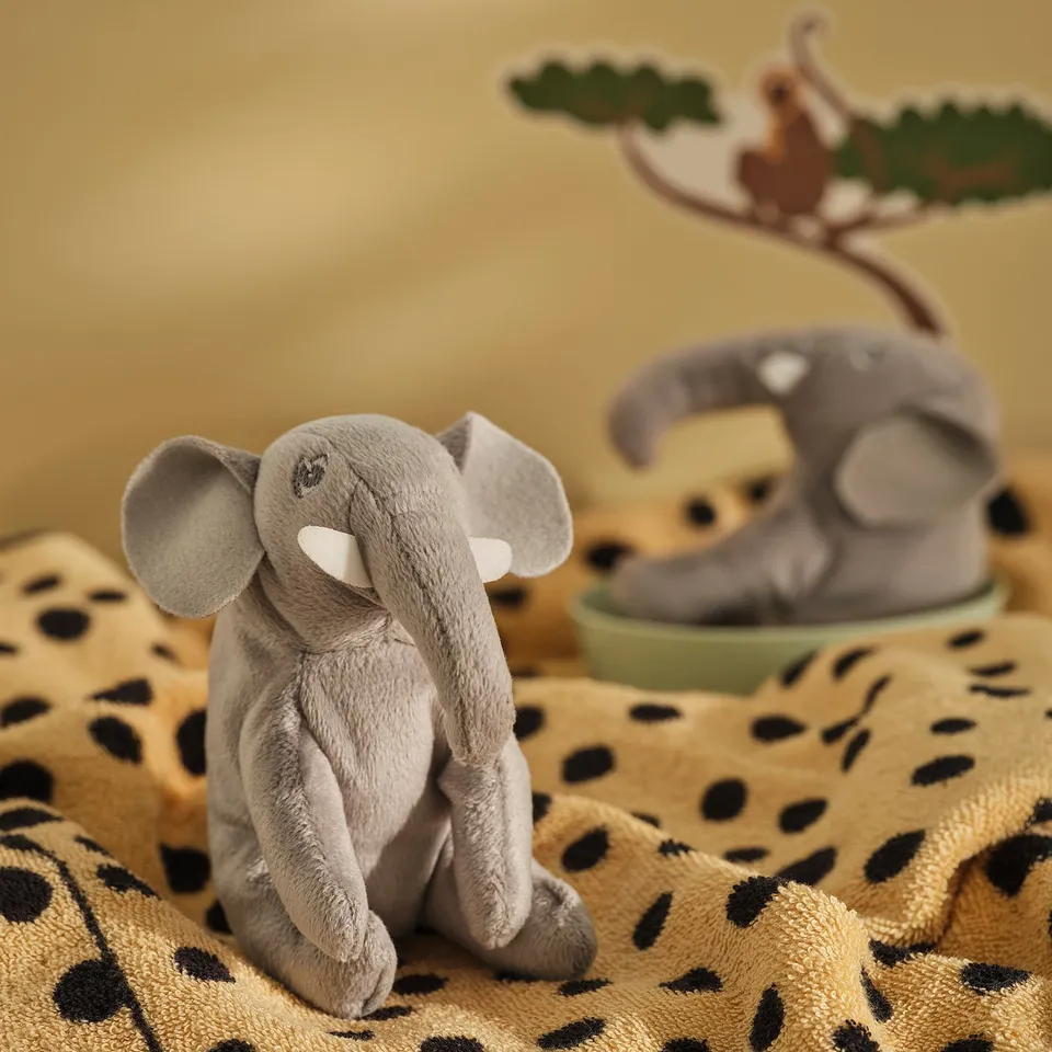 DJUNGELSKOG grey elephant toy, soft, sits on spotted blanket, small, safe, cuddly.