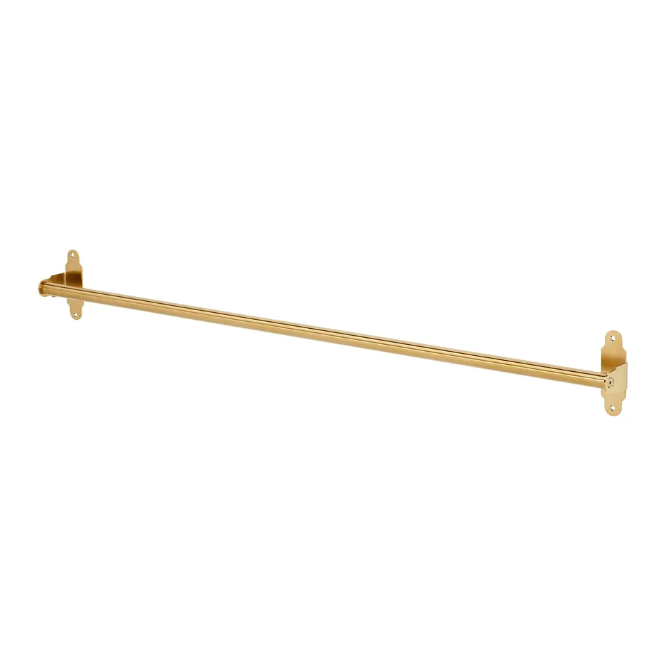 Gold-colored metal towel rail with two brackets.