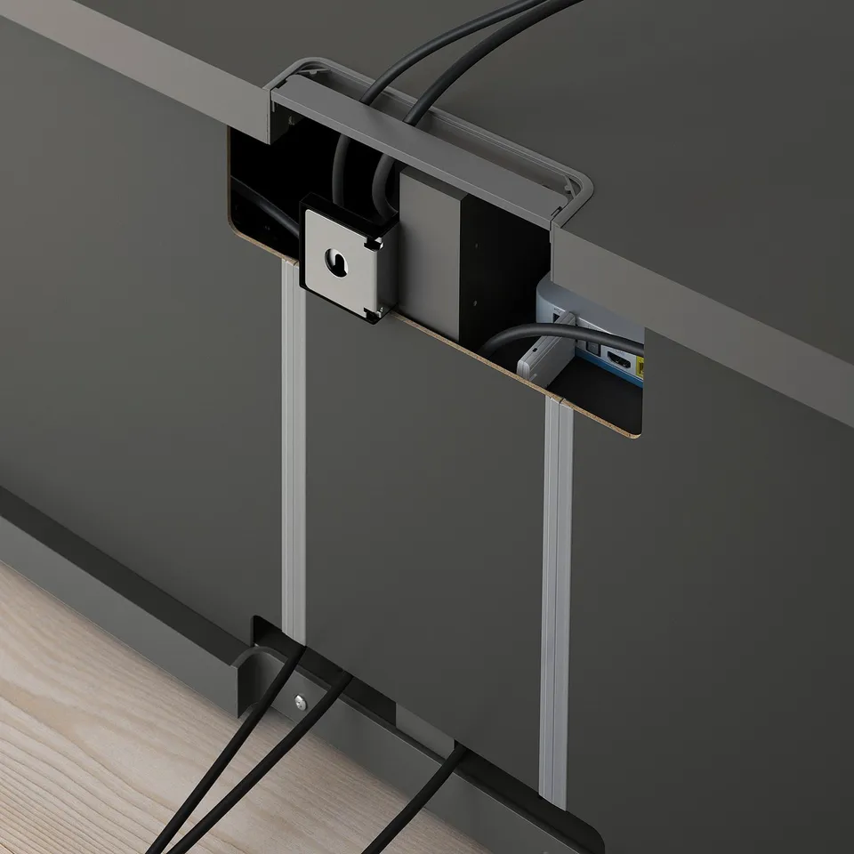 Cable management system: image shows a tv bench with a built-in cable outlet, keeping cables organised and out of sight.