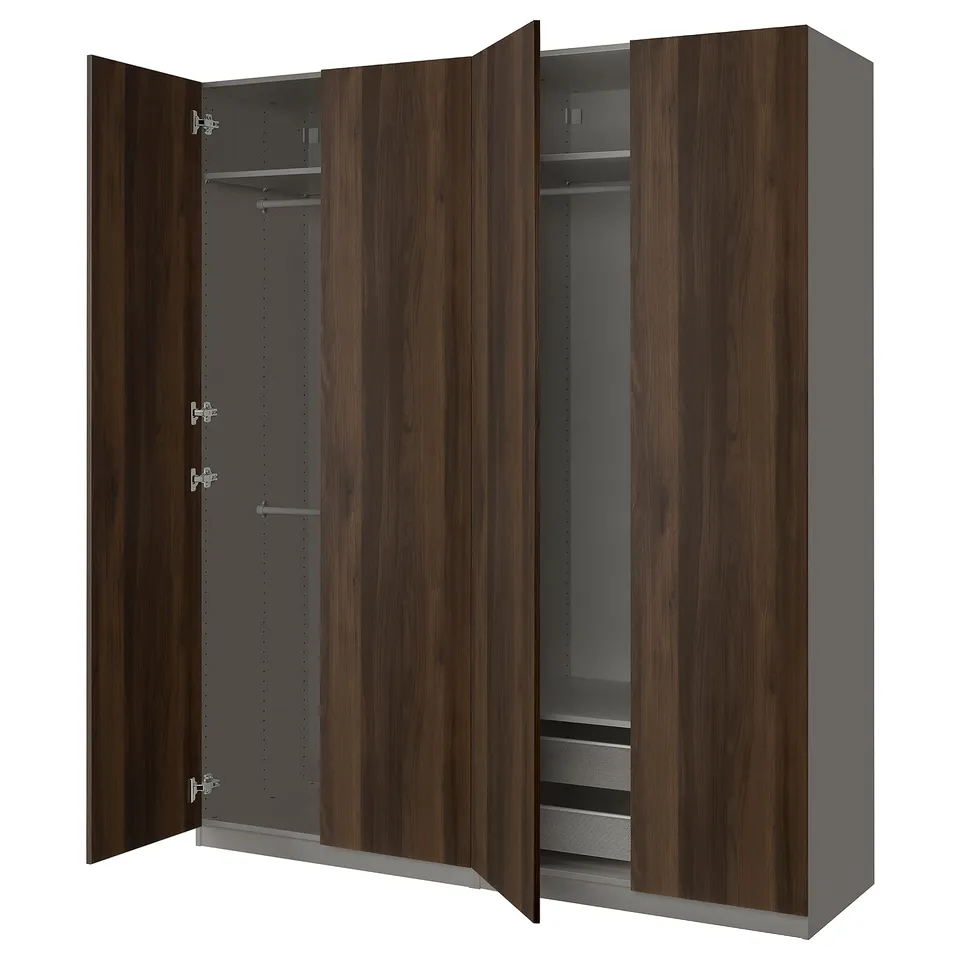 An open wooden wardrobe named PAX in dark brown colour with multiple shelves and a hanging rod inside.