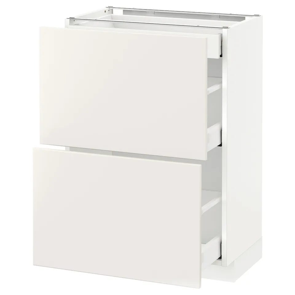 A white METOD kitchen cabinet with smooth surfaces and minimalist design, featuring multiple drawers.