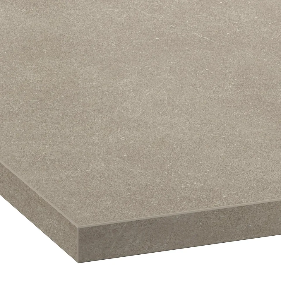Close-up of a smooth, beige-colored laminate worktop with subtle texture and straight edging, showcasing its high-quality finish and durability.