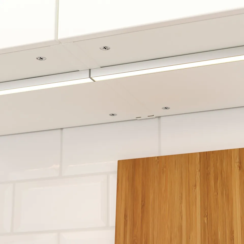 Modern kitchen ceiling with integrated led light strips, providing even and functional lighting for worktops.