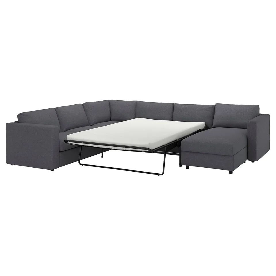 Grey VIMLE corner sofa-bed with white mattress, modern design, convertible.